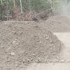 Proyek Jalan Rp1,45 Miliar di PALI Disorot: Batu Campur Tanah hingga Papan Proyek “Numpang” di Pohon